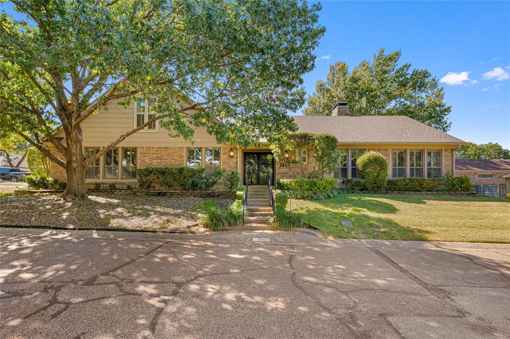 3901 Old Mill Road Waco, TX 76710 - Photo 3 of 40 a view of a house with a yard and large tree