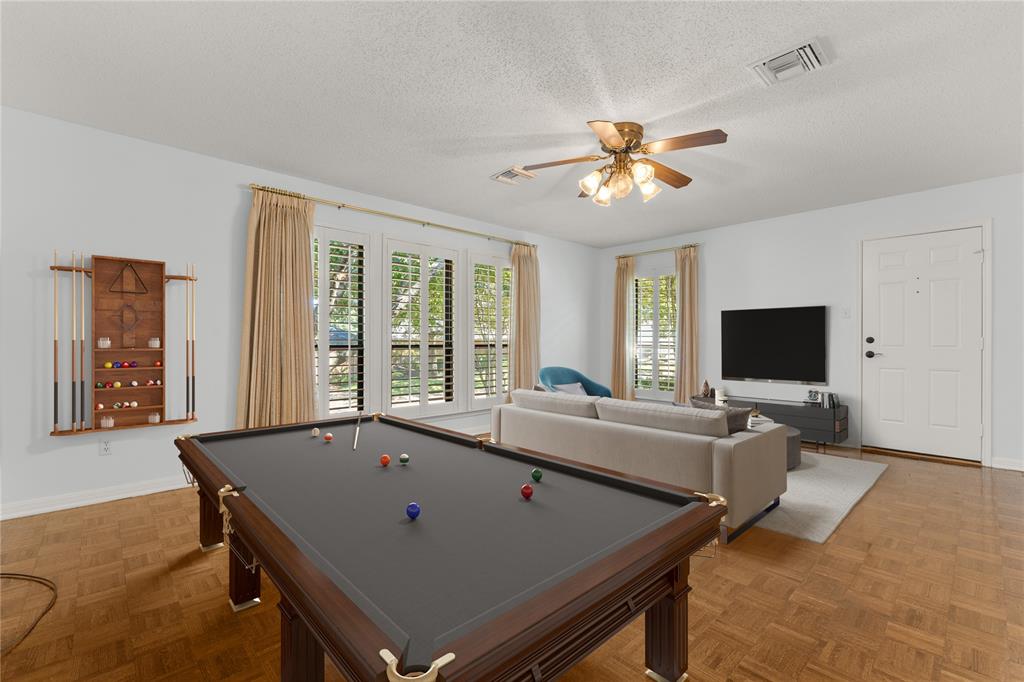 3901 Old Mill Road Waco, TX 76710 - Photo 6 of 40 a living room with furniture and a flat screen tv