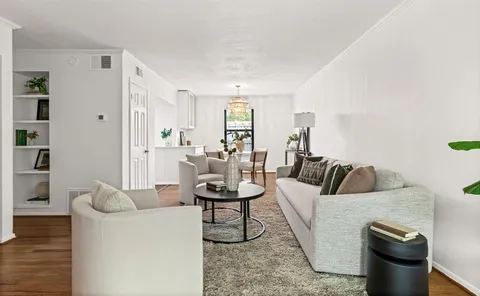 a living room with furniture and a couch