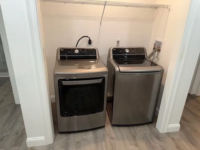 a utility room with dryer and washer