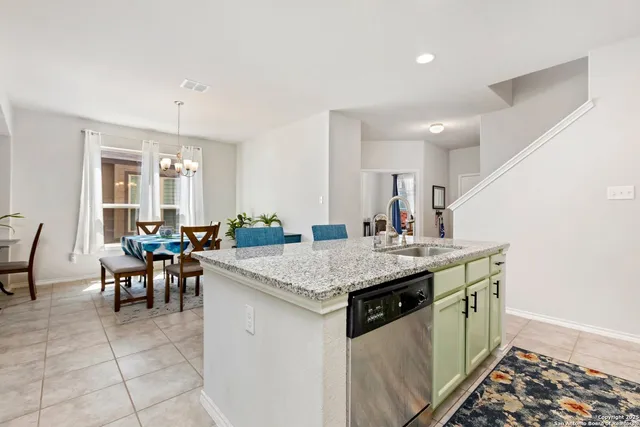 a view of a kitchen area with furniture and countertop