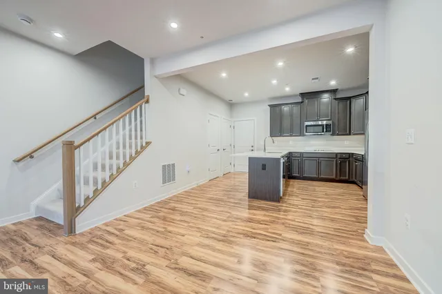 a view of kitchen with wooden floor