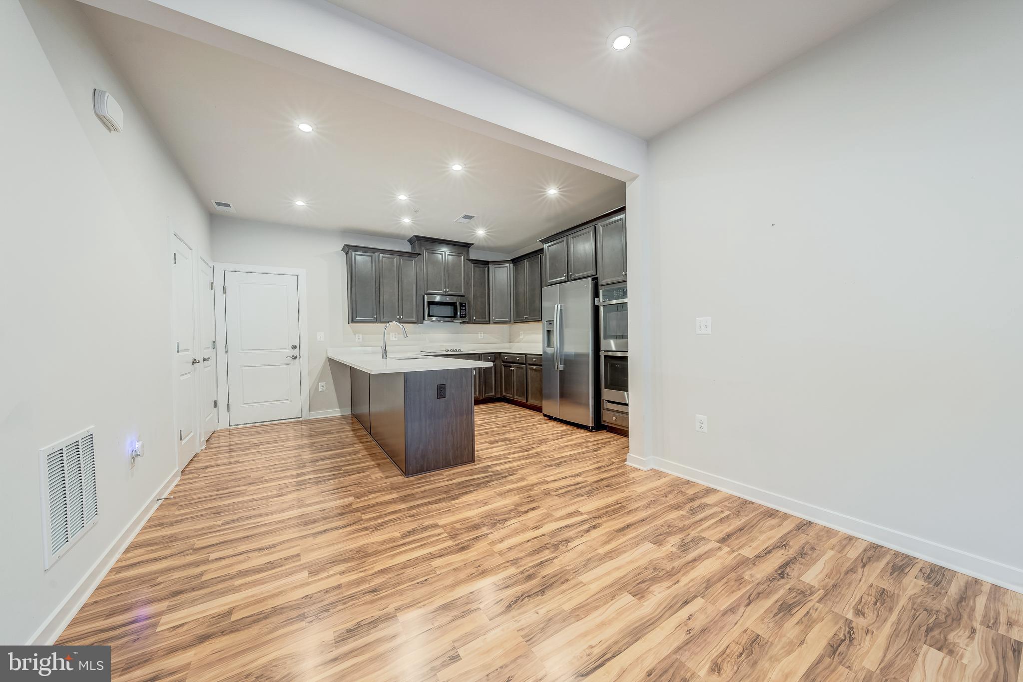 13504 Innovation Station Loop, Unit 2A Herndon, VA 20171 - Photo 12 of 36 a view of kitchen with sink