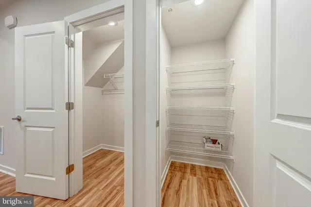 a bathroom with a tub and shower