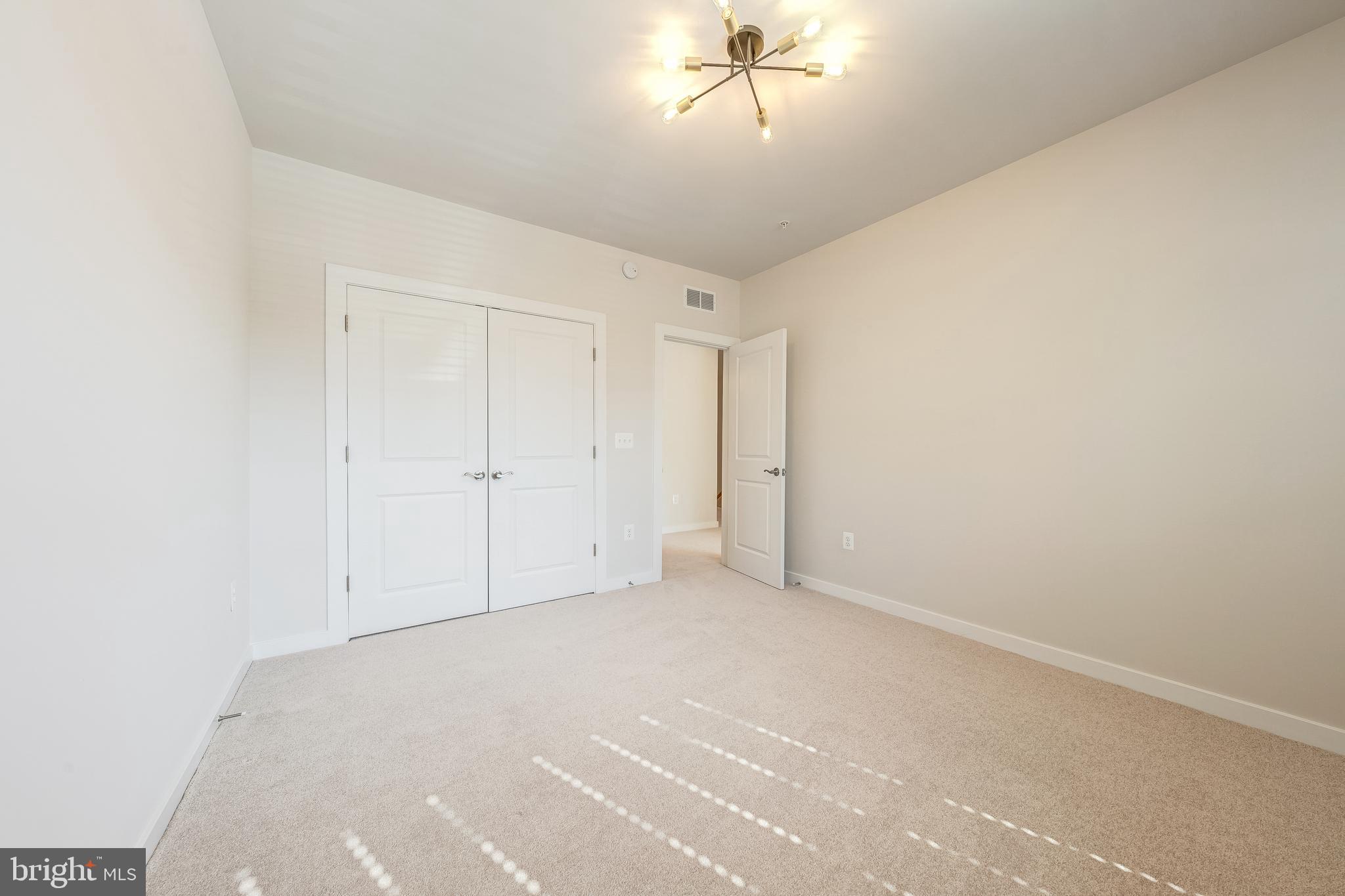13504 Innovation Station Loop, Unit 2A Herndon, VA 20171 - Photo 30 of 36 a view of an empty room