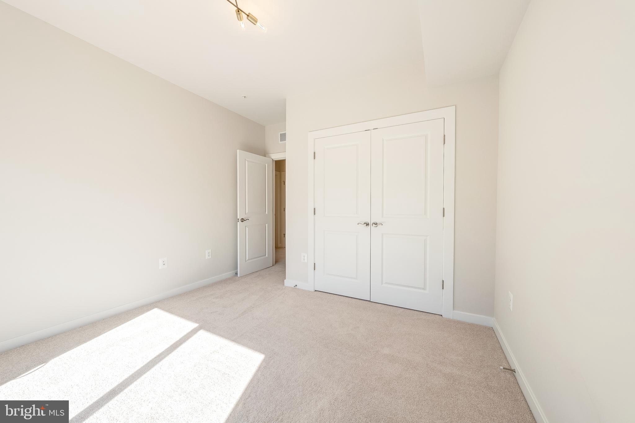 13504 Innovation Station Loop, Unit 2A Herndon, VA 20171 - Photo 32 of 36 a view of an empty room