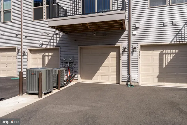 a view of backyard with small cabin