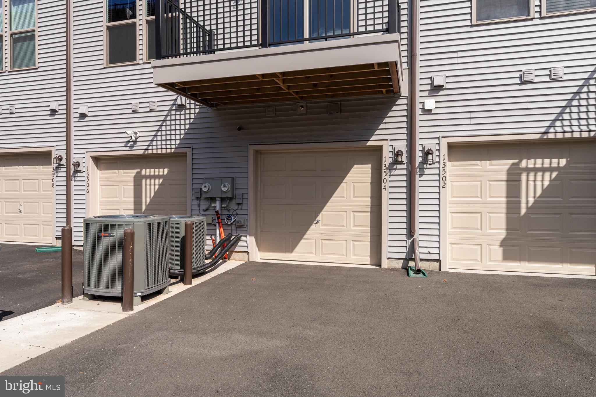 13504 Innovation Station Loop, Unit 2A Herndon, VA 20171 - Photo 5 of 36 a view of backyard with small cabin