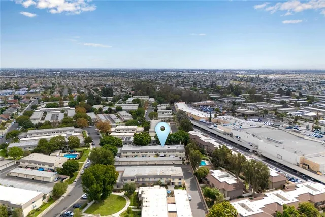 an aerial view of a house with outdoor space