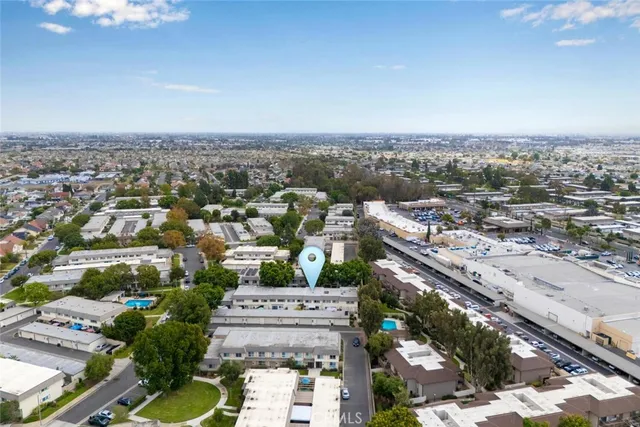 an aerial view of a city with lots of residential buildings