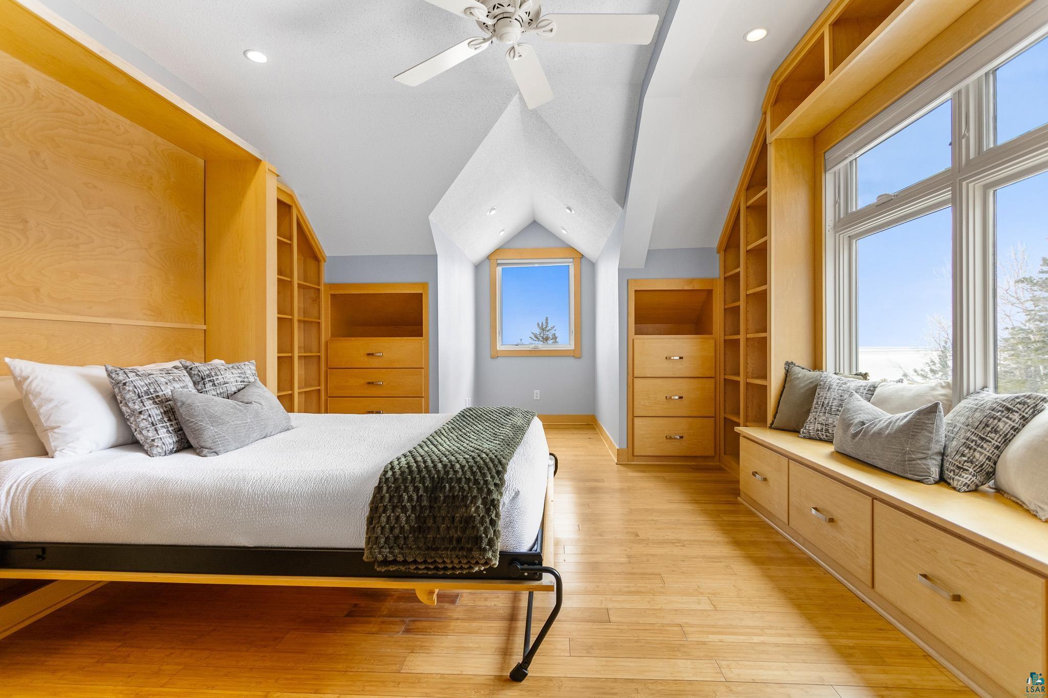 5163 Greenwood Road Duluth, MN 55804 - Photo 29 of 47 Room featuring light wood-finish flooring, a ceiling fan, and recessed lighting