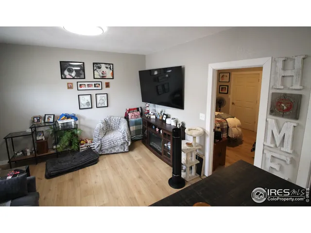 a backyard of a house with lots of green space and fountain