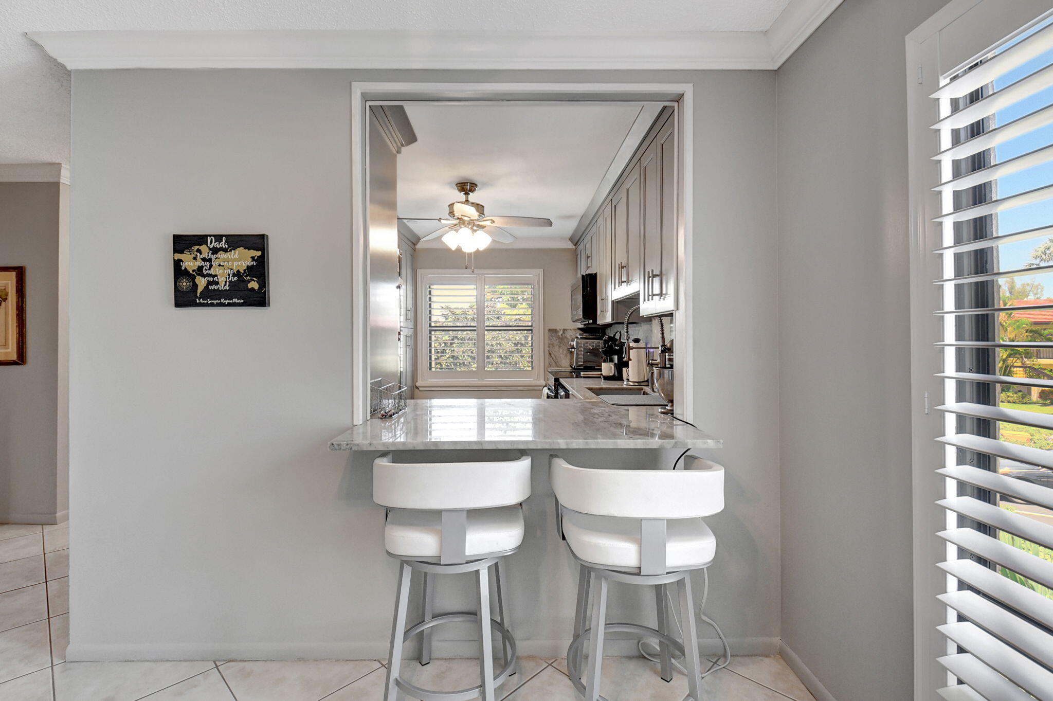 21214 Lago Circle, Unit B Boca Raton, FL 33433 - Photo 6 of 48 a view of a dining room with furniture and a window