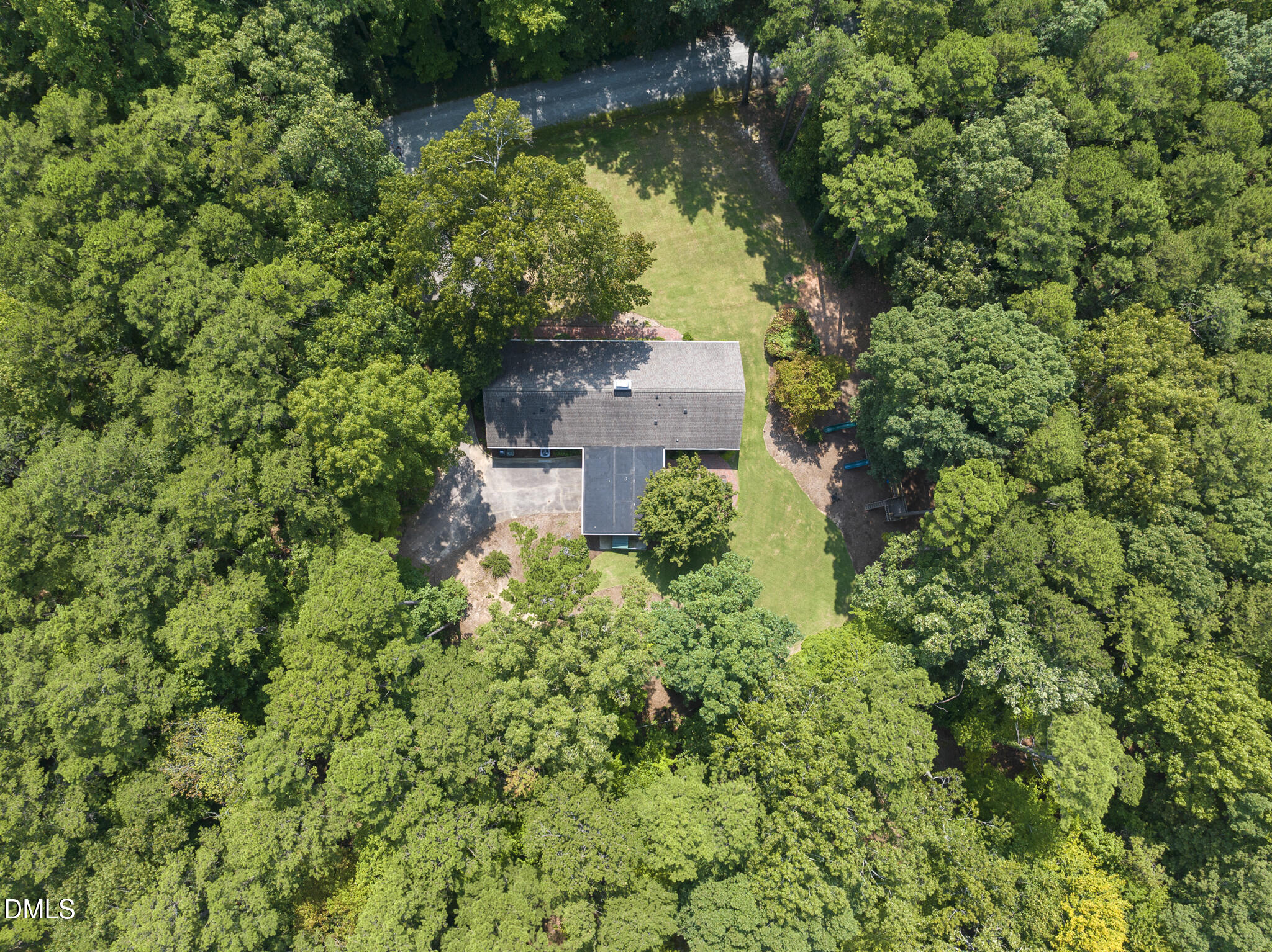 1605 Ridge Road Raleigh, NC 27607 - Photo 4 of 34 an aerial view of a house with a yard
