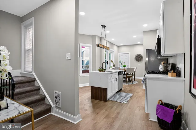 a kitchen with kitchen island granite countertop lots of counter top space