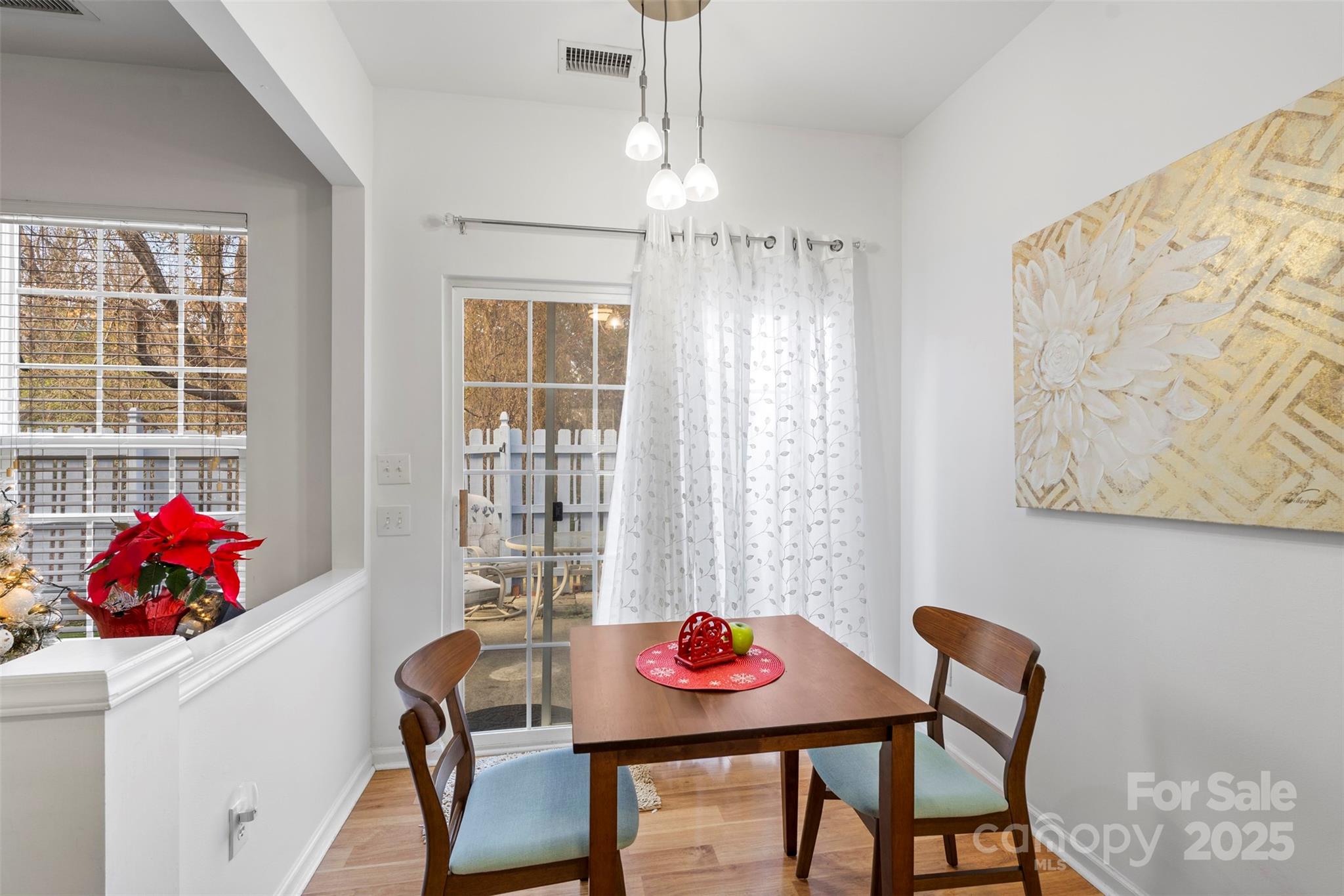 11730 Huxley Road Charlotte, NC 28277 - Photo 19 of 37 a dining room with furniture and window
