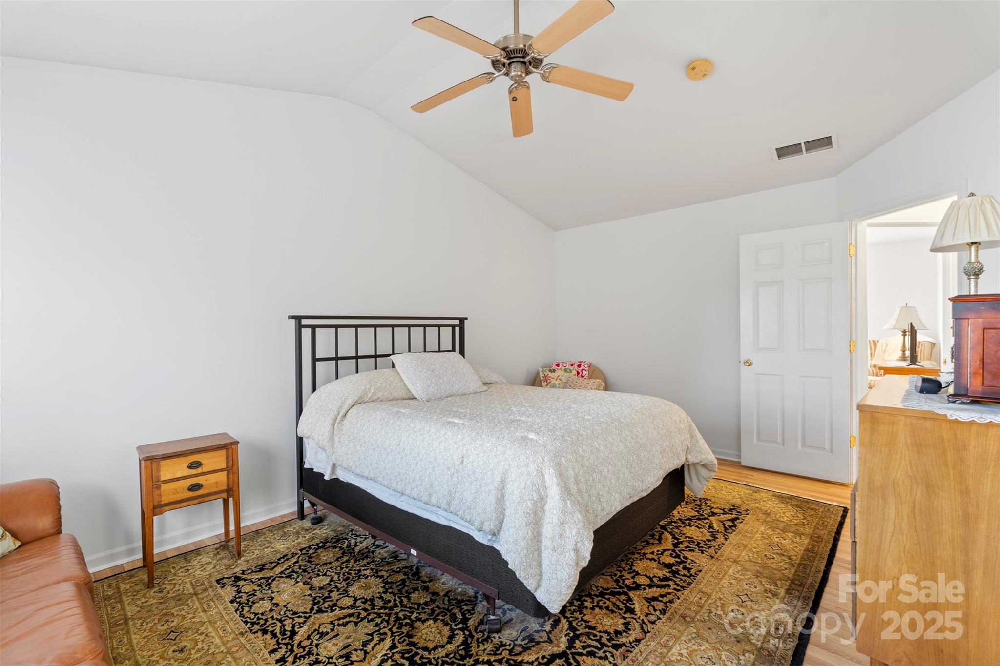 11730 Huxley Road Charlotte, NC 28277 - Photo 27 of 37 a bedroom with a bed and a dresser
