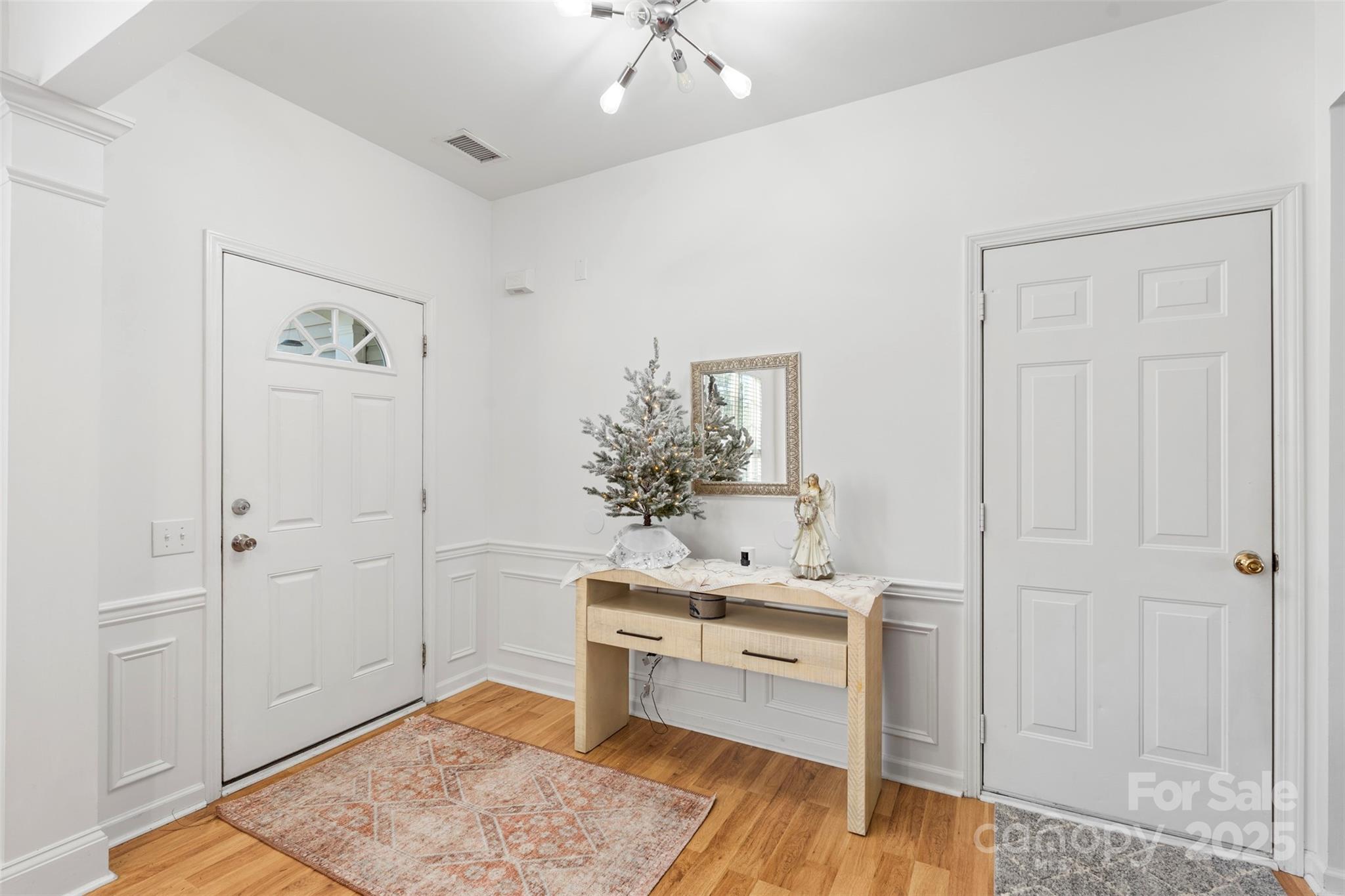 11730 Huxley Road Charlotte, NC 28277 - Photo 8 of 37 a bathroom with a sink and a mirror