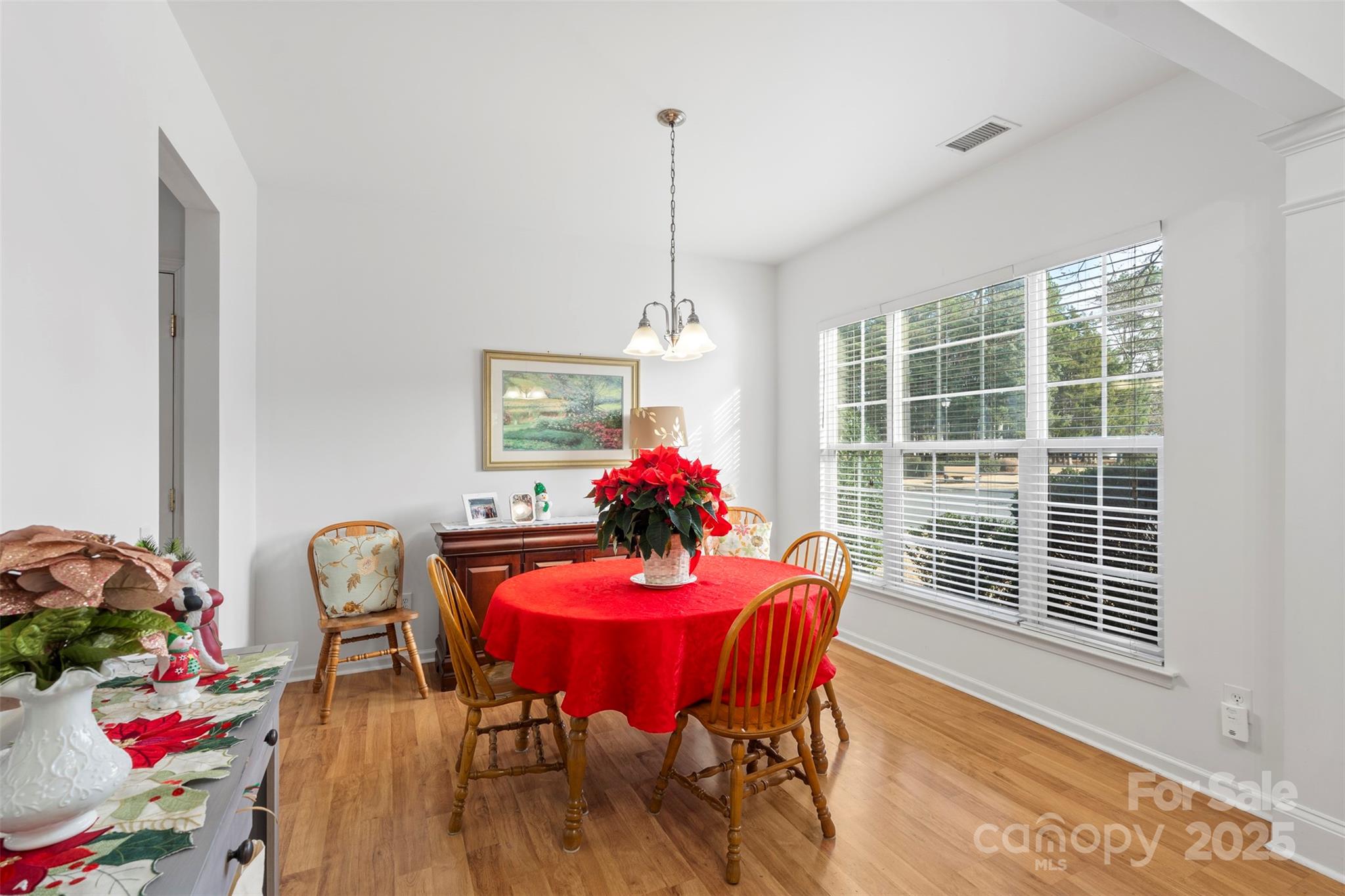 11730 Huxley Road Charlotte, NC 28277 - Photo 9 of 37 a dining room with furniture and window