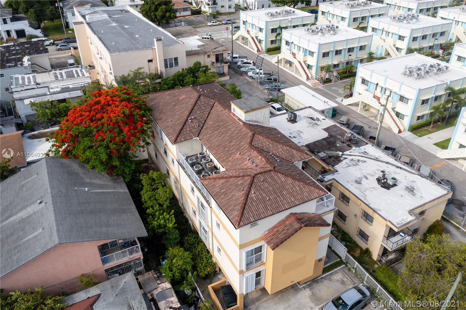 520 Southwest 5th Street, Unit 303 Miami, FL 33130 - Photo 2 of 49 an aerial view of residential houses with outdoor space