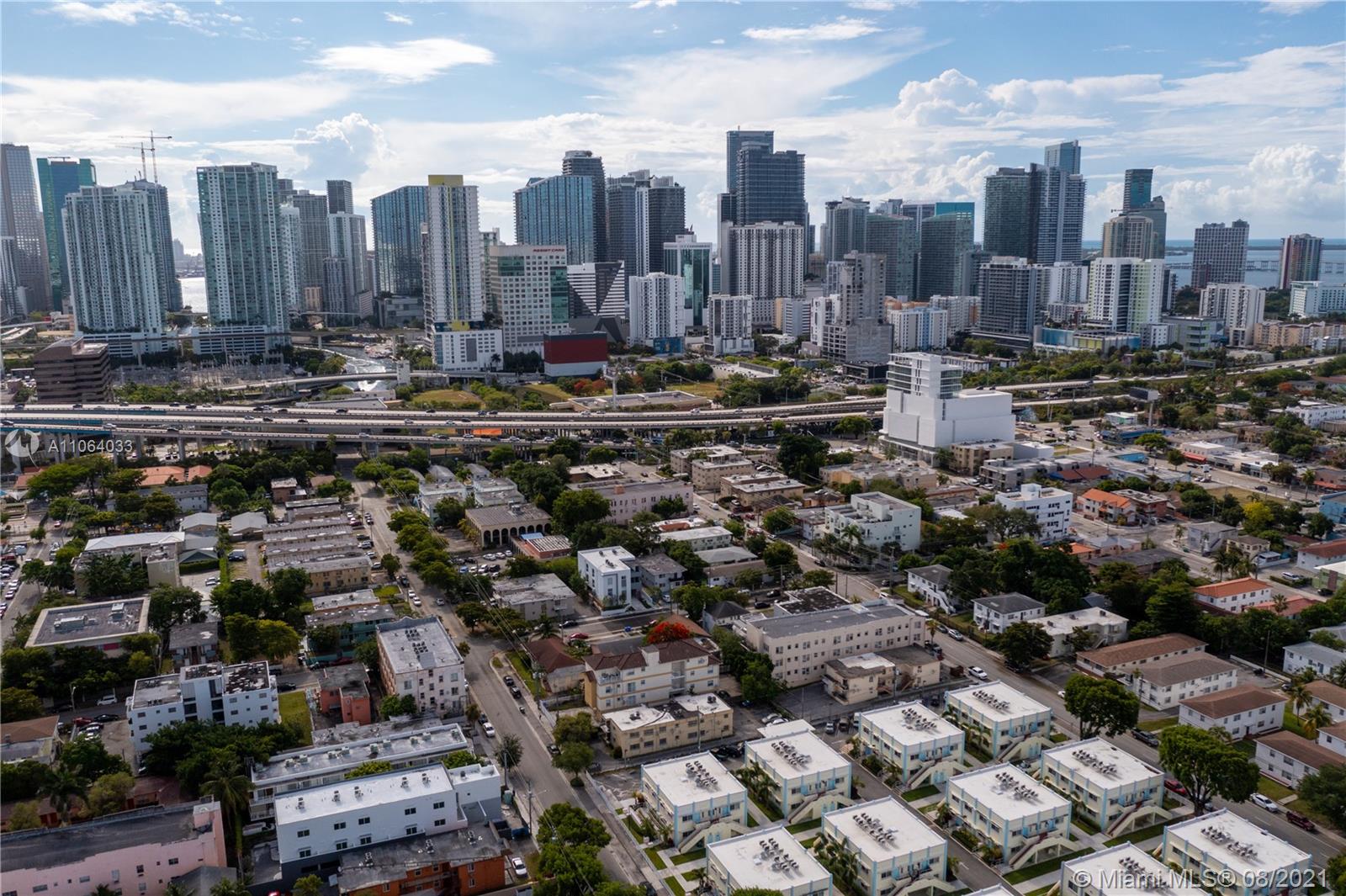 520 Southwest 5th Street, Unit 303 Miami, FL 33130 - Photo 19 of 49 a view of a city with tall buildings