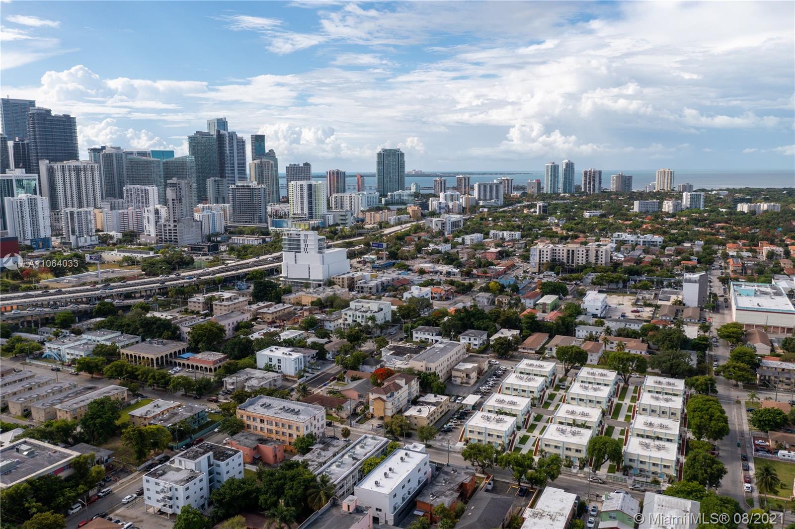 520 Southwest 5th Street, Unit 303 Miami, FL 33130 - Photo 20 of 49 a view of a city with tall buildings