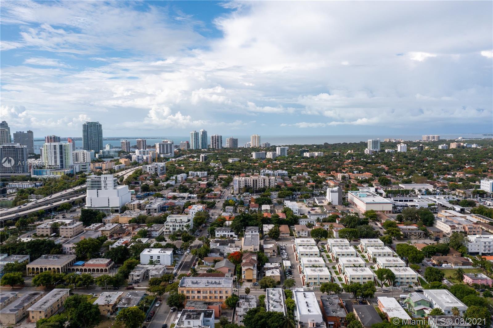 520 Southwest 5th Street, Unit 303 Miami, FL 33130 - Photo 22 of 49 an aerial view of a city with lots of residential buildings