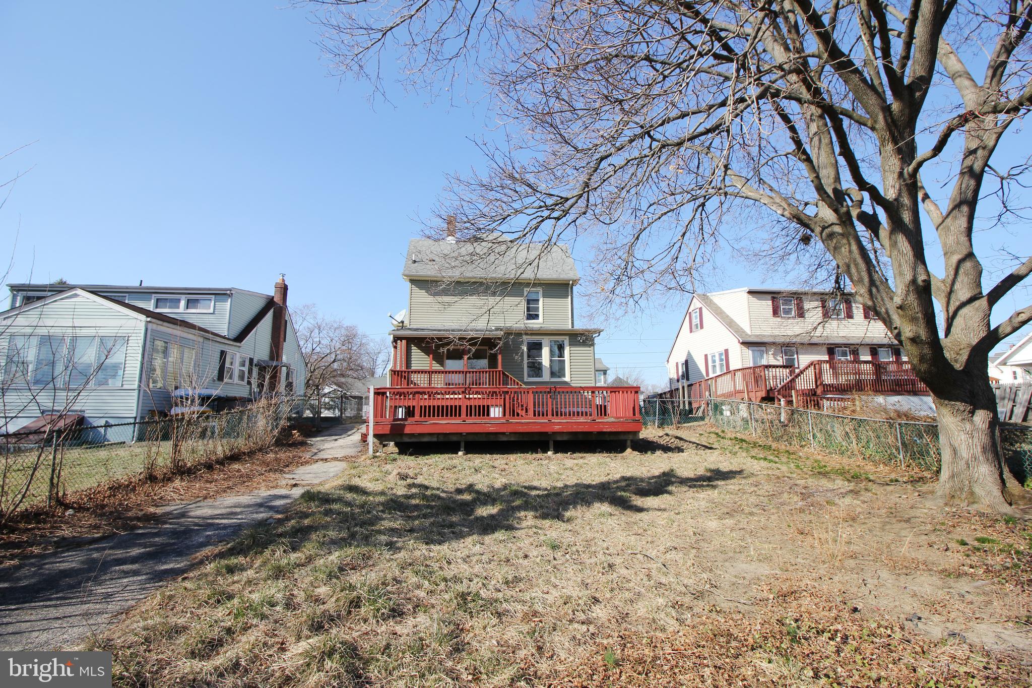 312 West Monroe Avenue Magnolia, NJ 08049 - Photo 26 of 29 a view of a house with a yard covered in snow