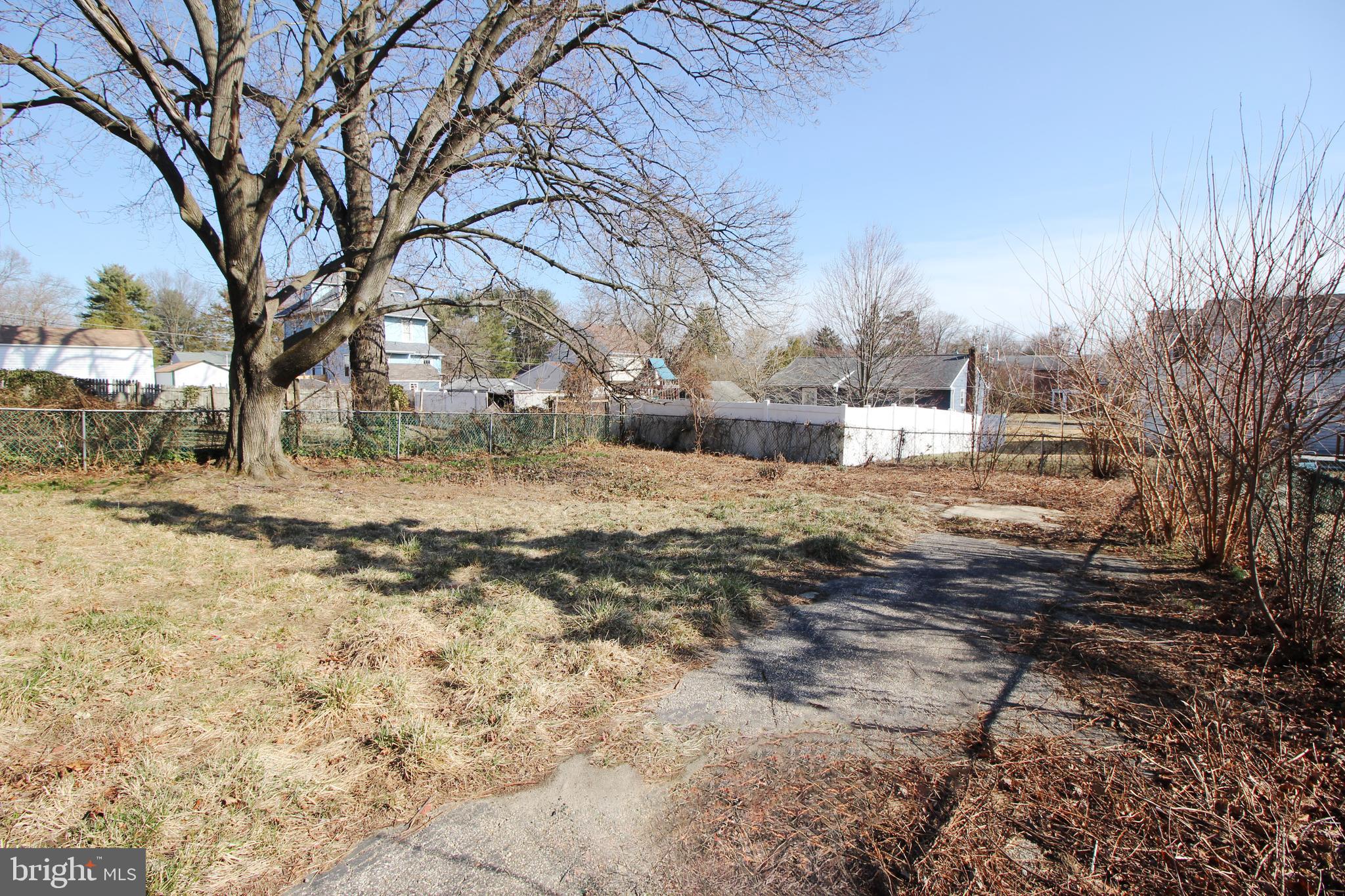 312 West Monroe Avenue Magnolia, NJ 08049 - Photo 29 of 29 a view of yard covered with snow in front of house
