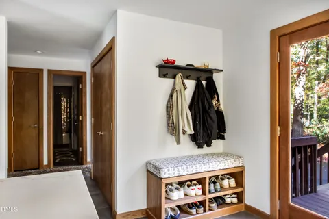 a view of room with furniture and closet