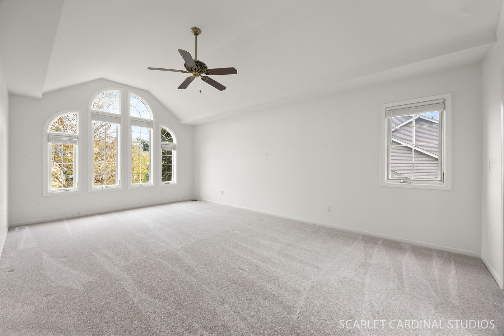 877 Elm Street Sugar Grove, IL 60554 - Photo 17 of 38 an empty room with windows and fan