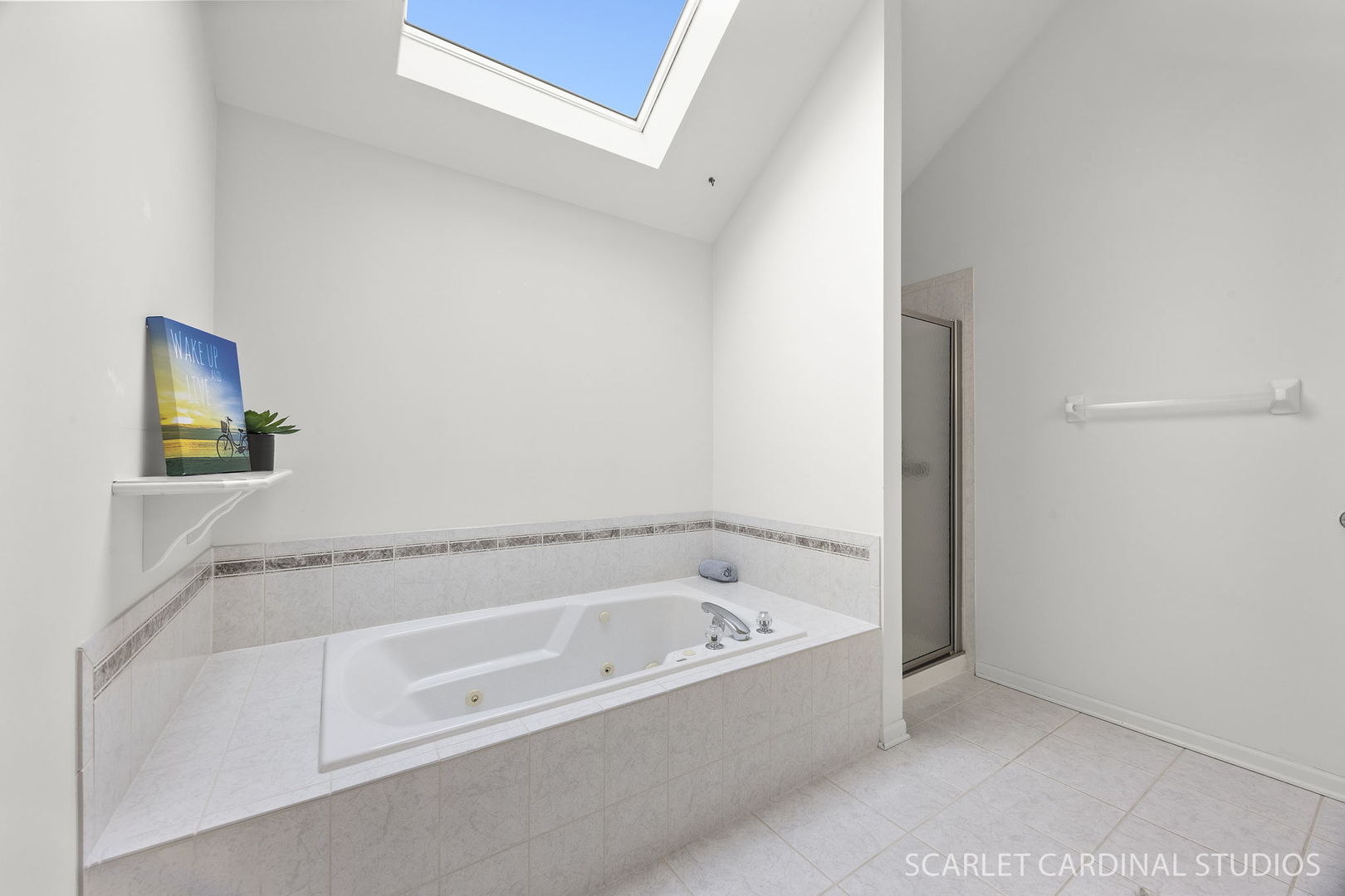 877 Elm Street Sugar Grove, IL 60554 - Photo 19 of 38 a white bath tub sitting next to a white sink and vanity
