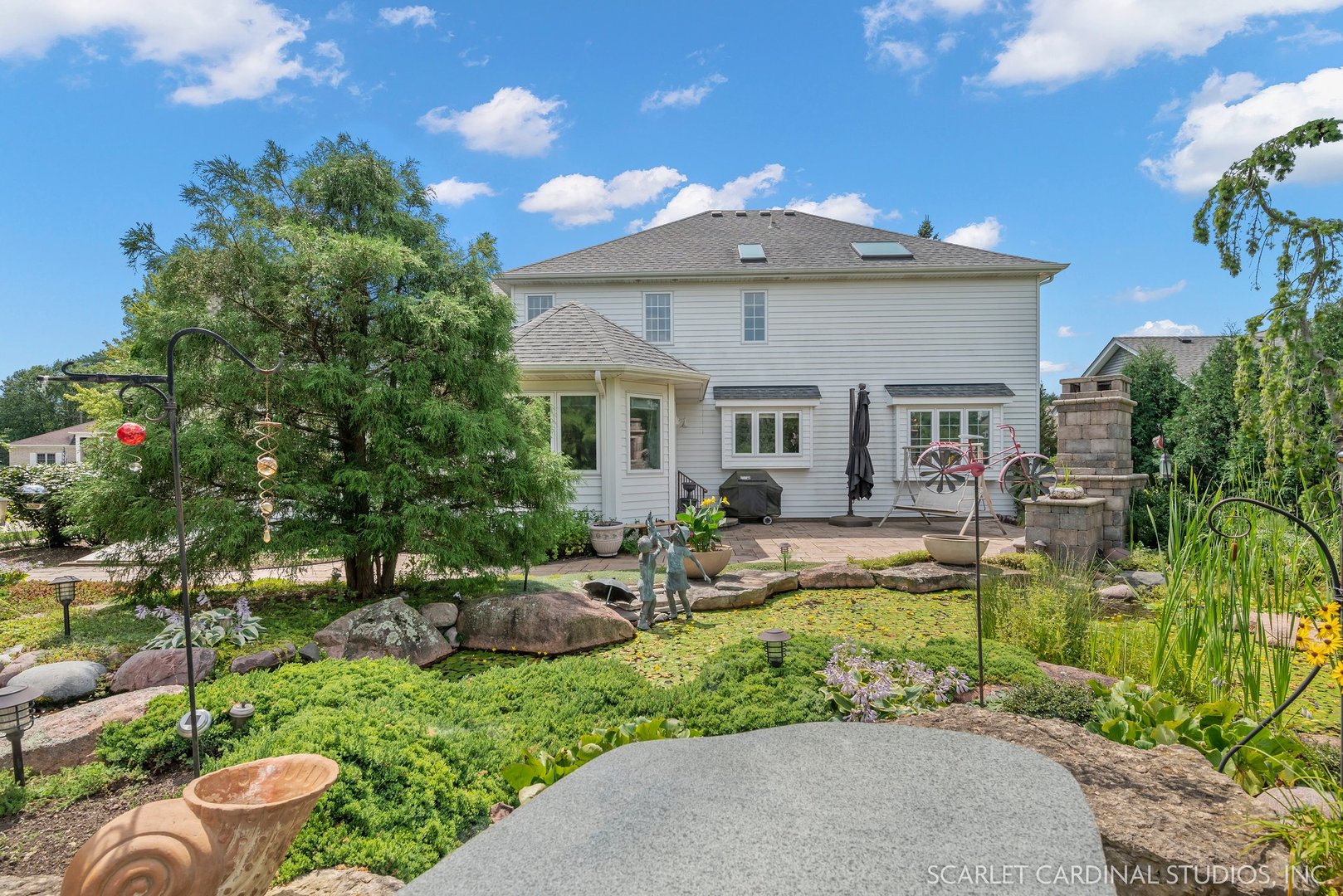 877 Elm Street Sugar Grove, IL 60554 - Photo 30 of 38 a view of a house with backyard and sitting area
