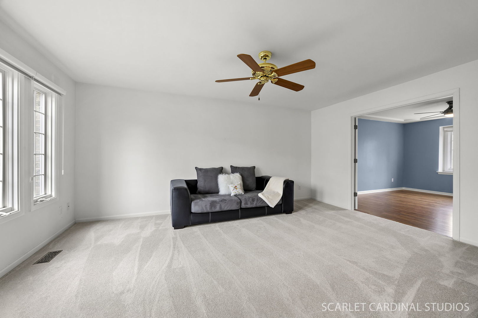 877 Elm Street Sugar Grove, IL 60554 - Photo 3 of 38 a living room with a bed furniture and a window