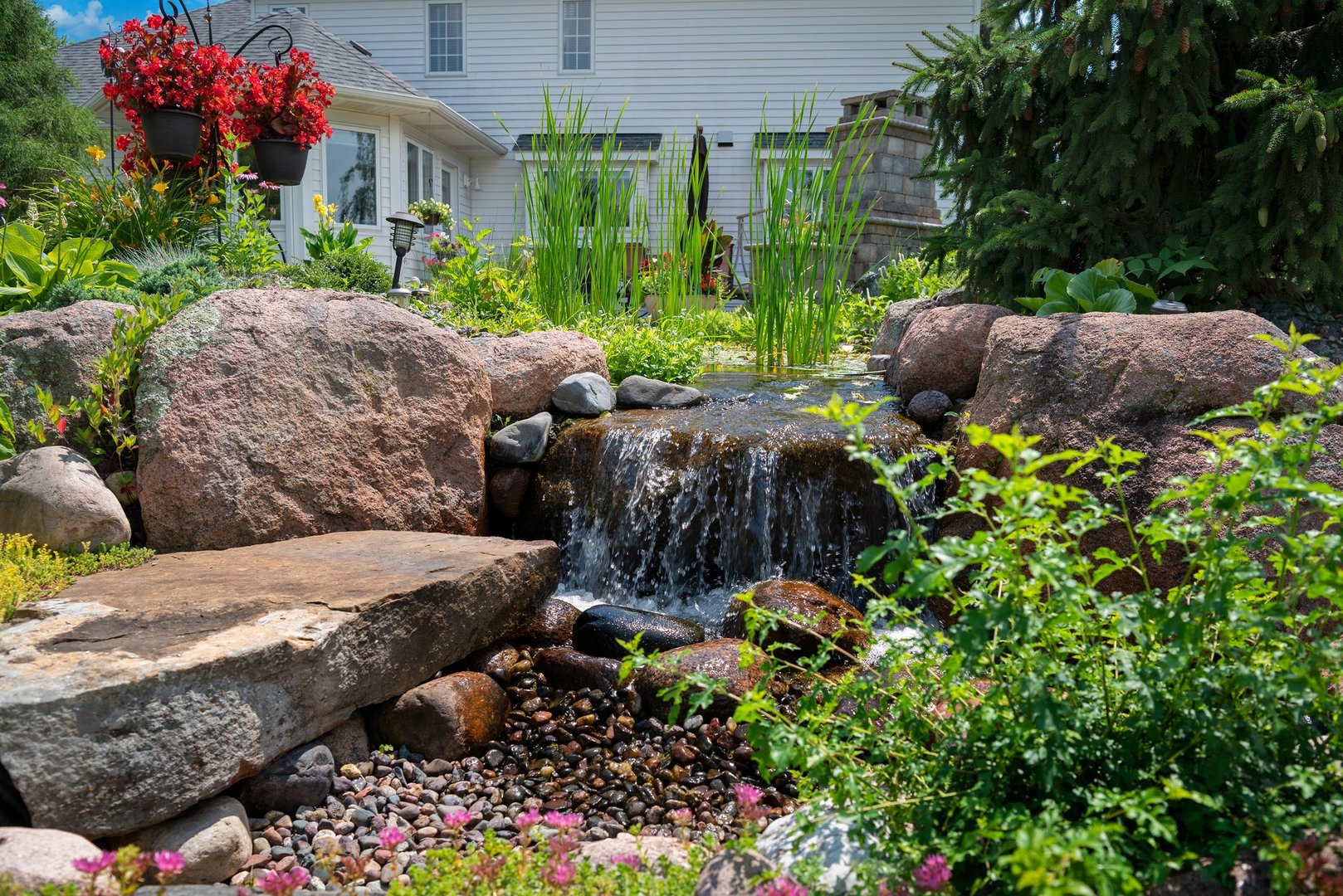 877 Elm Street Sugar Grove, IL 60554 - Photo 31 of 38 a view of backyard with outdoor seating and flowers