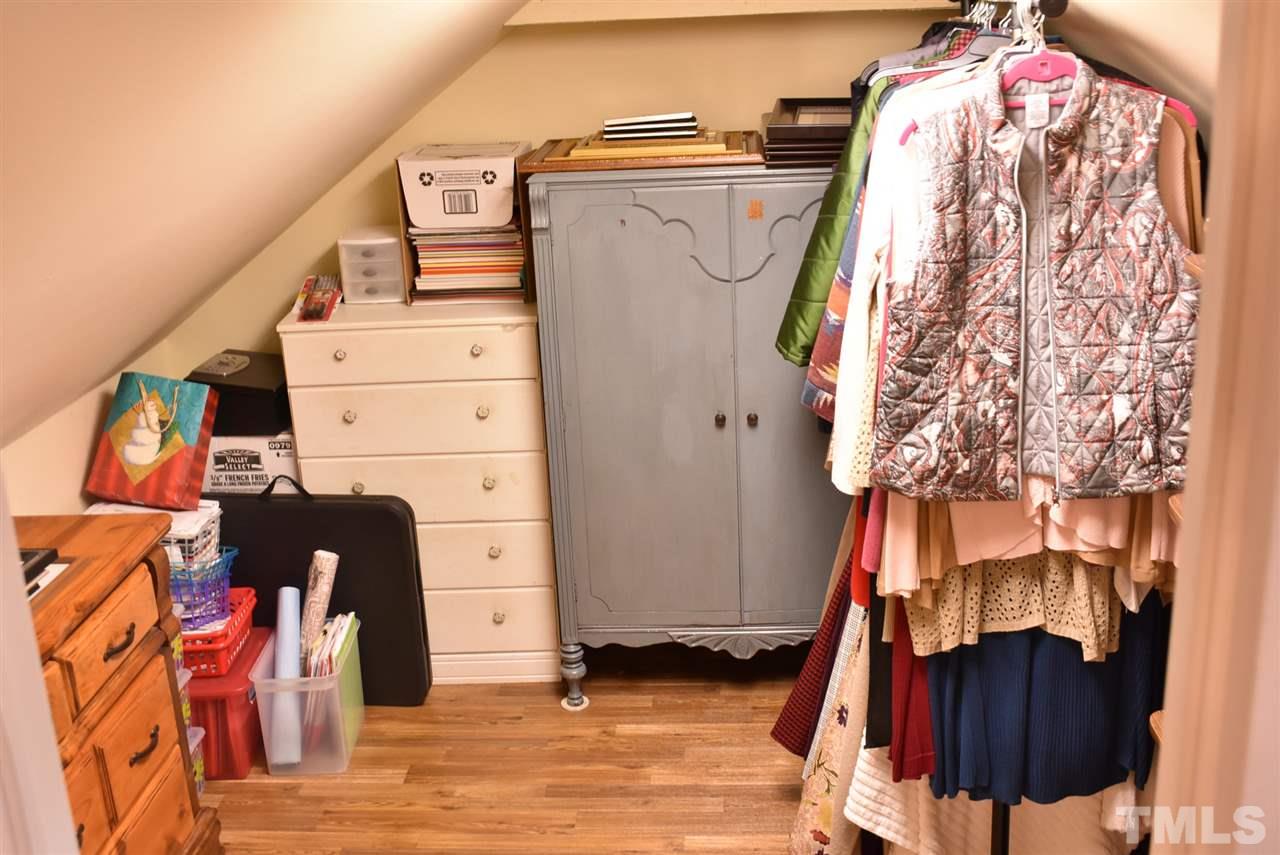 4629 Mill Rock Lane Raleigh, NC 27616 - Photo 23 of 30 a view of walk in closet with clothes and shoes