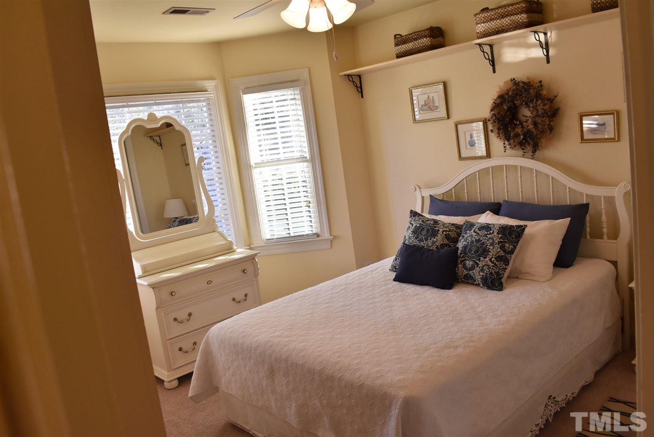 4629 Mill Rock Lane Raleigh, NC 27616 - Photo 24 of 30 a bedroom with a bed and a window