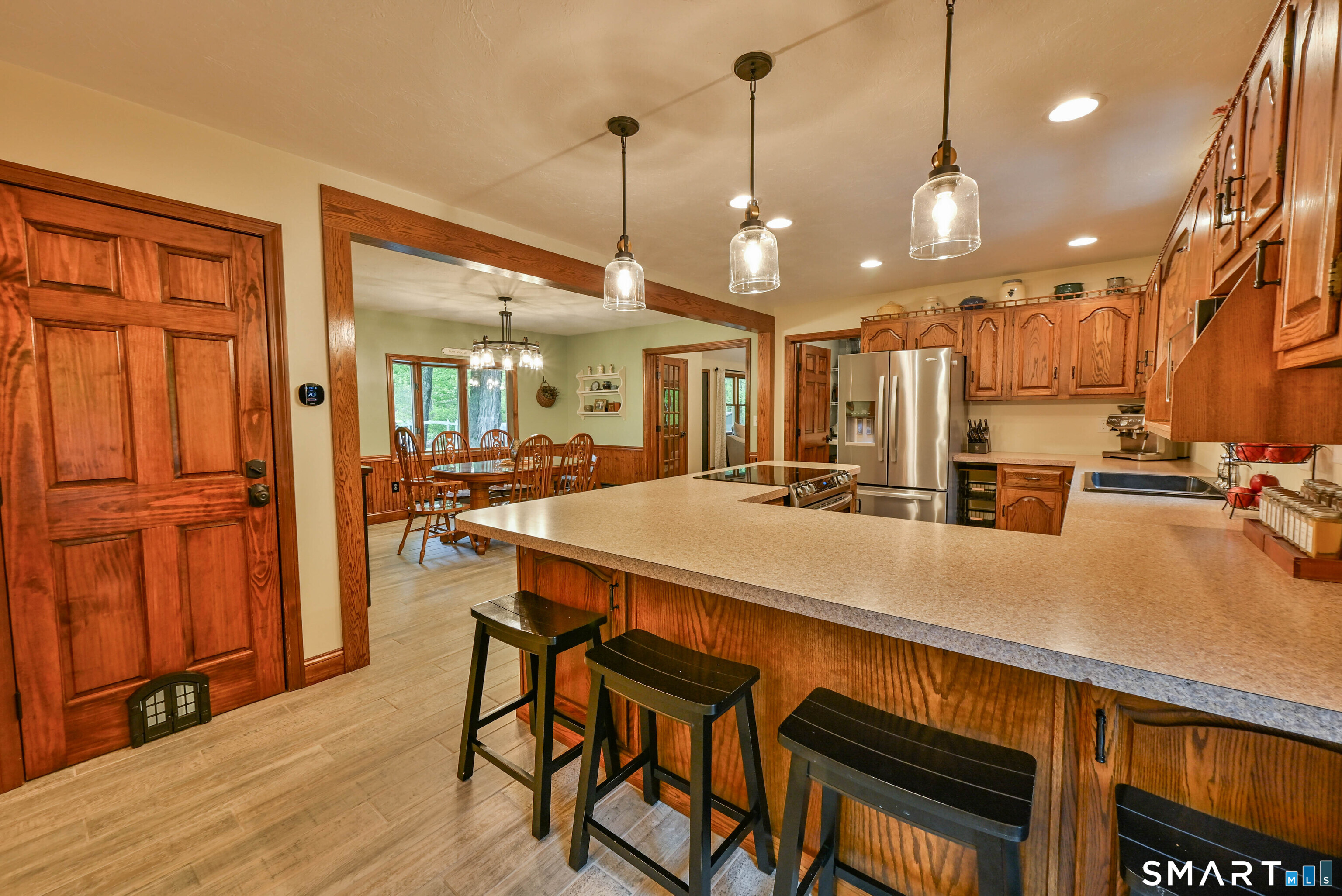 309 O'Leary Road Thompson, CT 06277 - Photo 27 of 40 a large kitchen with a table and chairs
