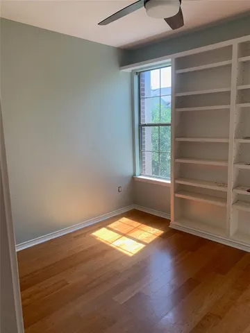 a view of a room with closet and window