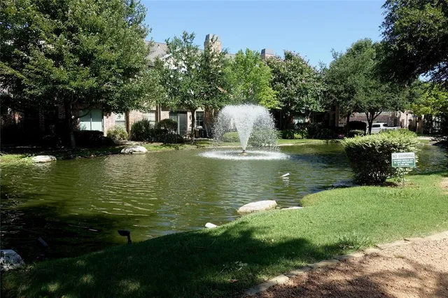 a view of a backyard of the house
