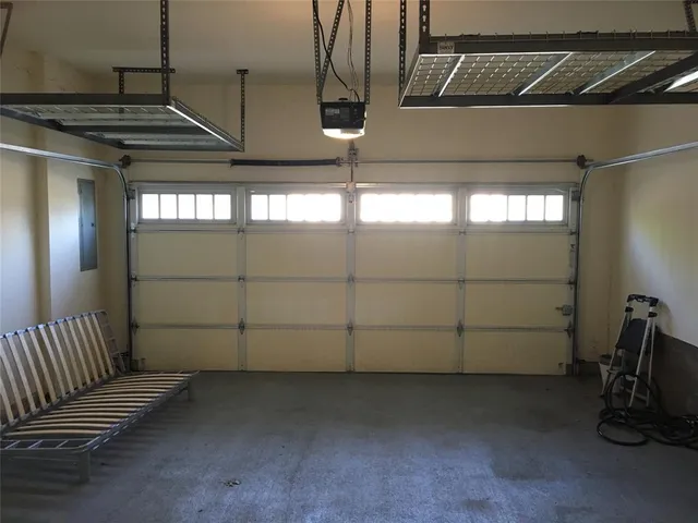 a view of room with furniture and a ceiling fan