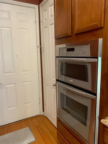 a kitchen with appliances and cabinets