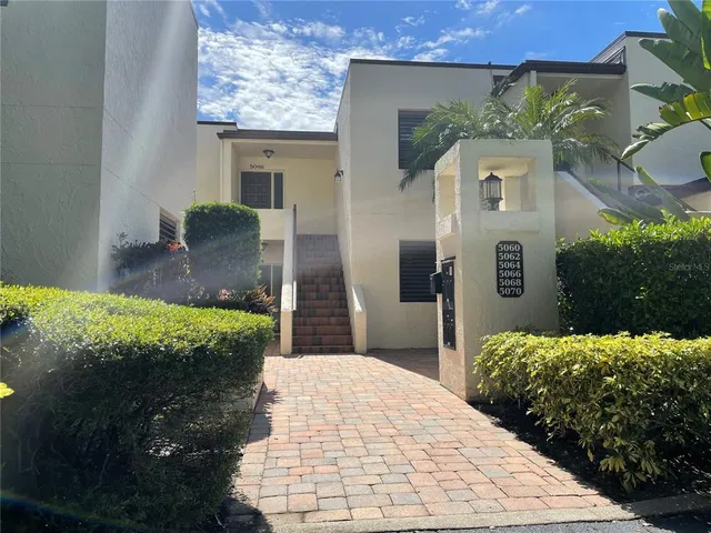 a view of a back yard of the house