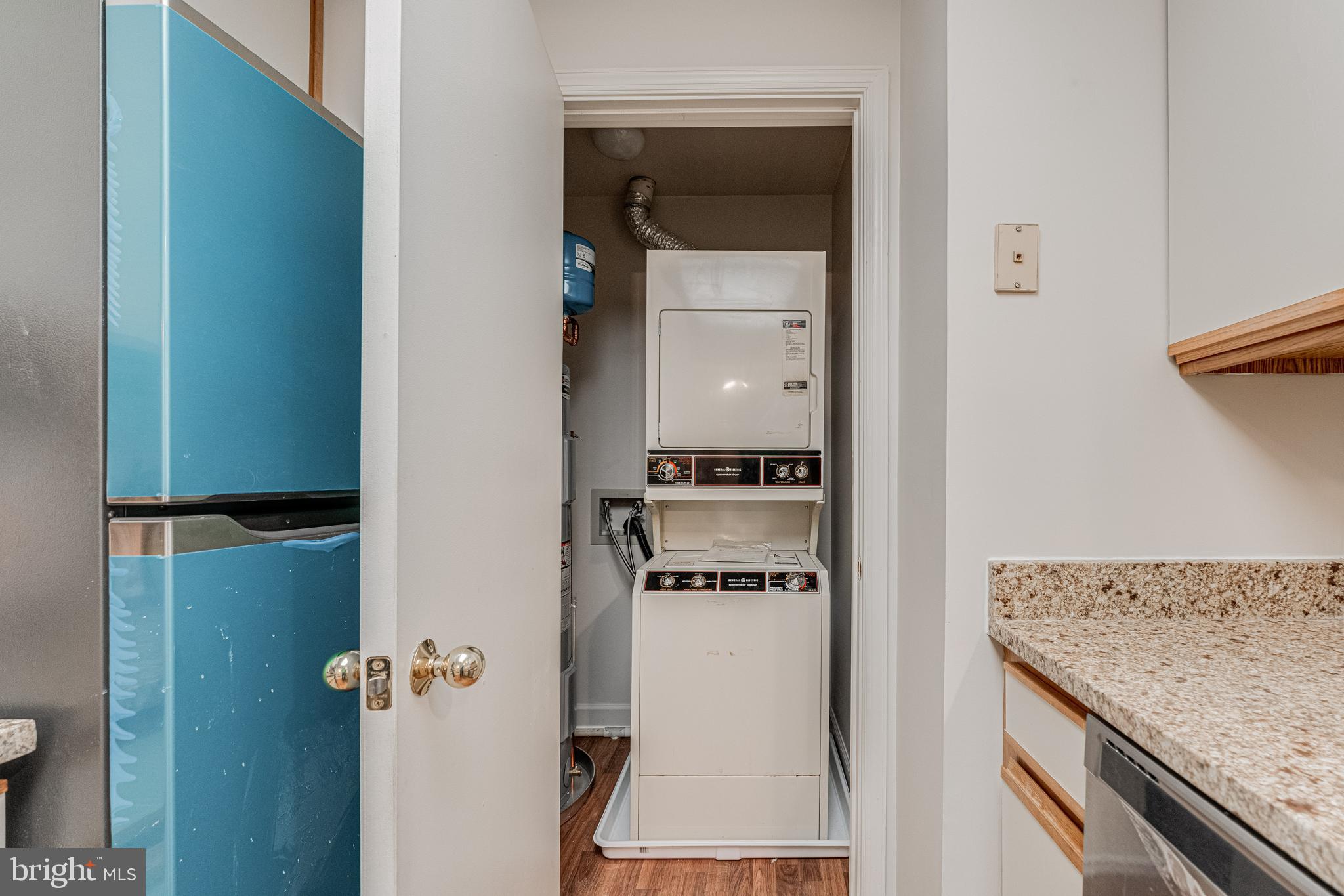13603 Sir Thomas Way, Unit 2B33 Silver Spring, MD 20904 - Photo 10 of 31 Washer/Dryer off Kitchen, New Water Heater '21