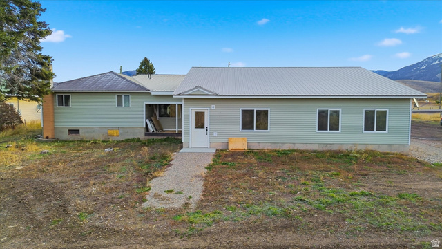 165 Main Street Georgetown, ID 83239 - Photo 50 of 50 View of front facade featuring a metal roof and crawl space