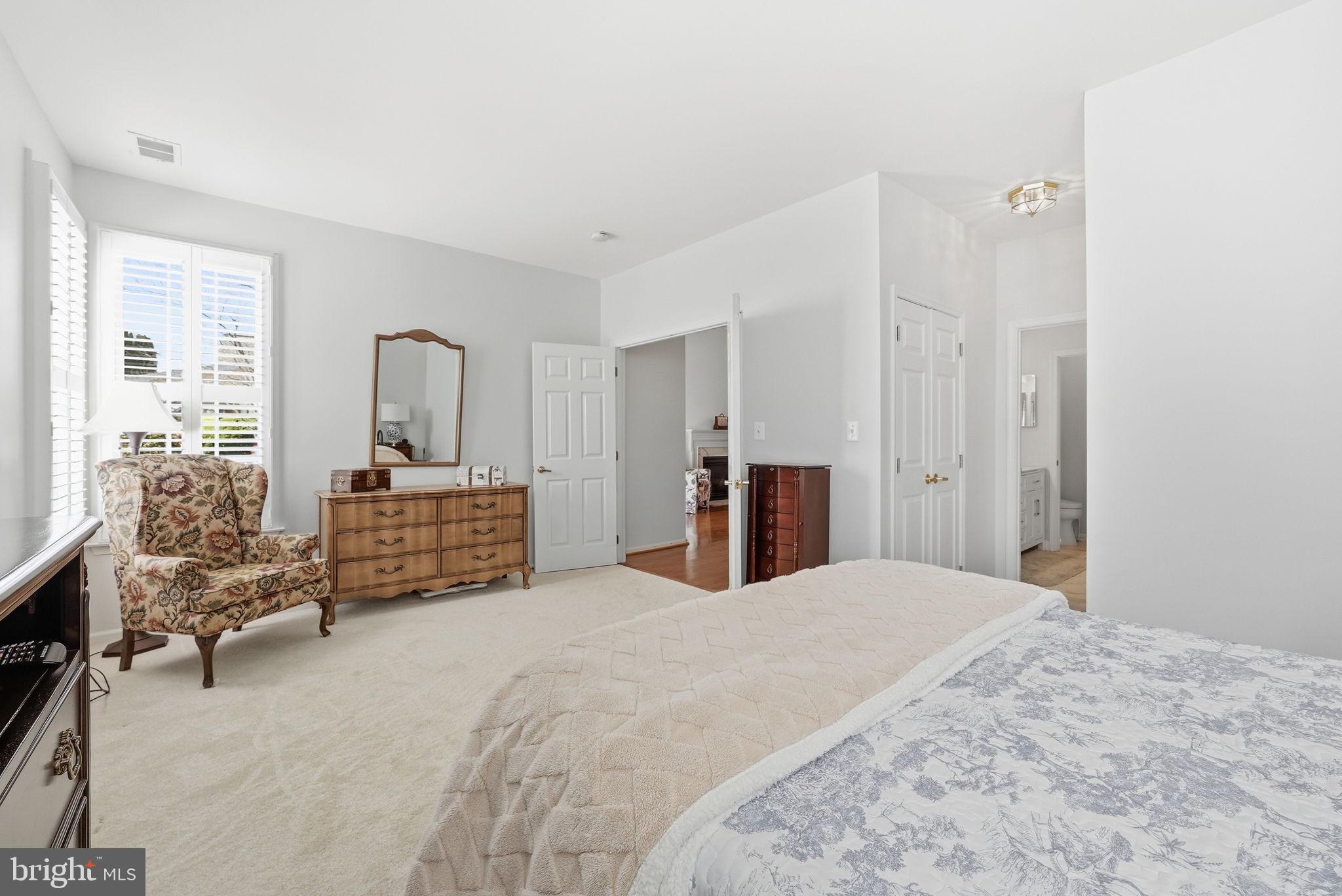 6828 Derby Run Way Gainesville, VA 20155 - Photo 18 of 30 Serene bedroom with natural light.