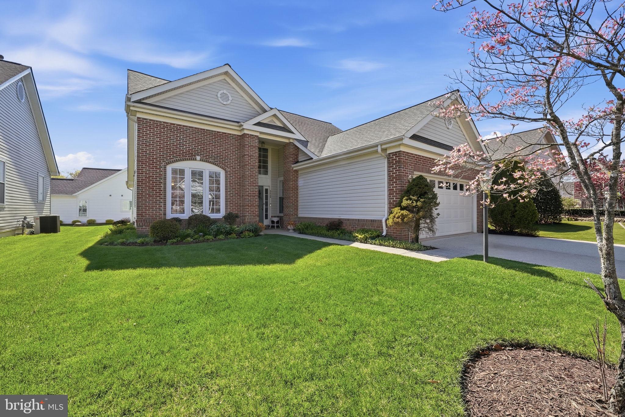 6828 Derby Run Way Gainesville, VA 20155 - Photo 2 of 30 Charming brick home with lush lawn.