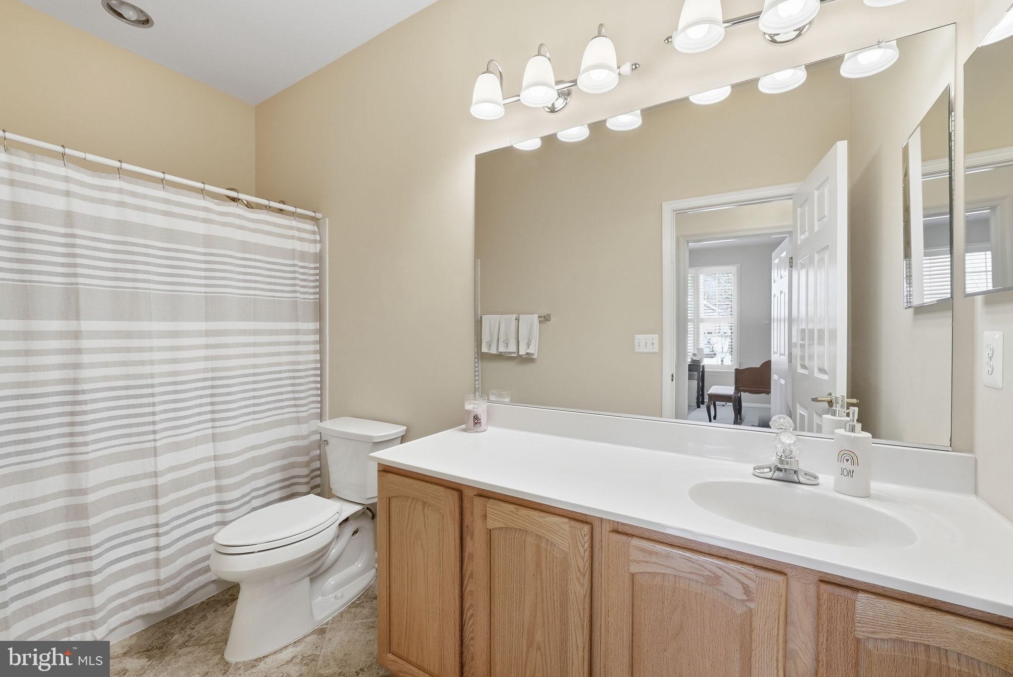6828 Derby Run Way Gainesville, VA 20155 - Photo 21 of 30 Bright and inviting bathroom retreat.