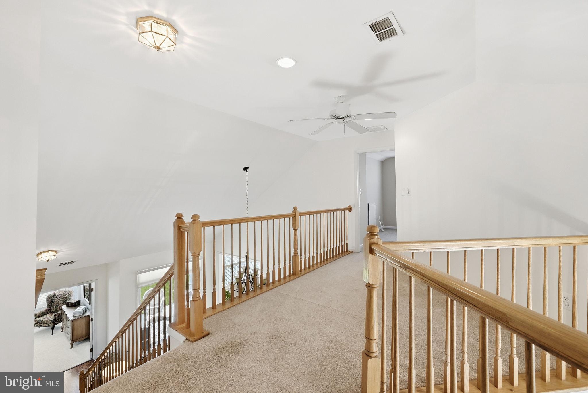 6828 Derby Run Way Gainesville, VA 20155 - Photo 22 of 30 Bright and airy second-floor landing.