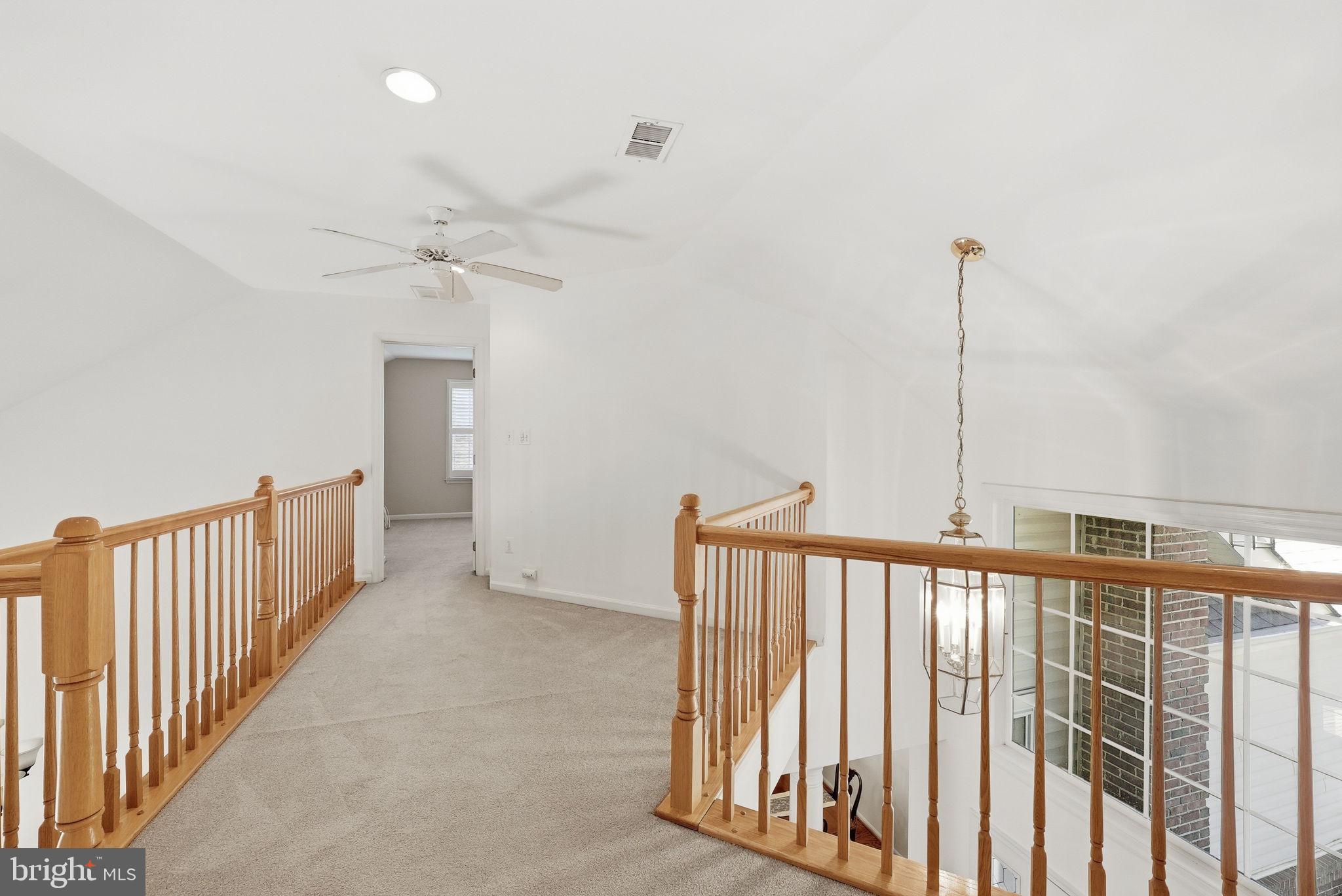 6828 Derby Run Way Gainesville, VA 20155 - Photo 23 of 30 Bright and airy upper landing space.